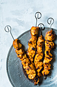 Grilled chicken skewers with a yoghurt and spice marinade
