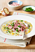 Leek and corn soup with smoked ham