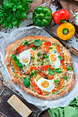 Pizza with pepper and eggs