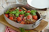 Mediterranean chicken breast with cherry tomatoes and basil