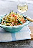 Tagliatelle with salmon and mange tout