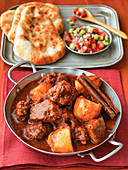 Indian lamb rogan gosh with naan and pickles