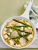 Frittata with goat'ss cheese, potatos and asparagus