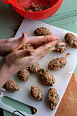 Moroccan lamb meatballs being made