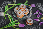 Mini Bundt cakes with marzipan and icing sugar