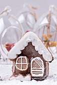 Sweet Christmas gingerbread cookies in shape of house and Christmas trees