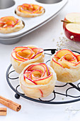 Tasty fresh baked roses made of red sweet apples