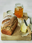 Crusty Wholemeal bread with orange marmalade and butter