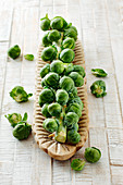 Brussels sprouts on a wooden dish