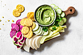 Tomatillo salsa guacamole with vegetable chips