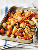Oven roast winter vegetables with sweet potato pumpkin shallots and carrots with thyme and rosemary