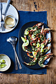 Grilled king prawns with rosemary and lime butter