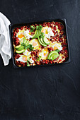 Mexican tray bake with kidney beans and eggs