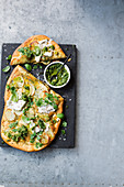 Potato, green tapenade and herb spelt pizza