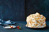 Pistachio and rose bombe Alaska ice-cream cake