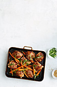Sticky chicken with carrots and sesame