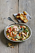 Bouillabaisse with vermouth (French seafood soup)