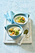 Sweet rice cream soup with exotic fruits and pistachios