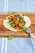 Tortillas with vegetables and minced meat mix