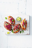 Sweet potatoes with chicken and jalapeno slaw