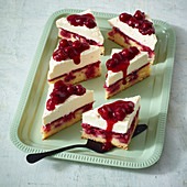 Cherry jelly poke cake with vanilla cream