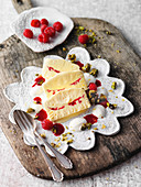 Semi-freddo with raspberries, pistachio brittle and dabs of yoghurt