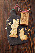 Gingerbread with an embossing stamp on a slate board