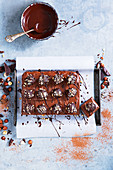 Chocolate slices with hazelnuts and chocolate balls