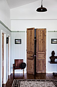 Vintage leather chair next to a rustic wooden table