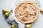 Tart with poached pears and almond frangipane