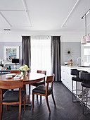 Dining area with a round table in an open kitchen