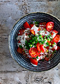 Tomato salad with spring onions and yoghurt