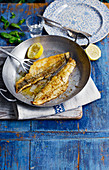 Pan-fried fish with lemon