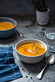 Roasted butternut squash soup with chili oil and thyme