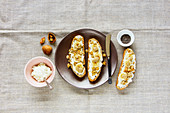 Ricotta cheese toasts with banana and nuts