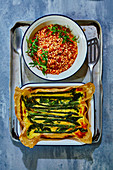 Asparagus and giant couscous with tomatoes