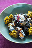 Mussels with sauce and algae