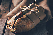 Rustic bread loaf on dark background
