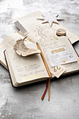 Open diary and star decoration on top of astrology book