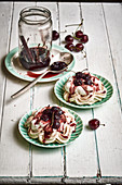 Cinnamon meringue with spices and syrup infused cherries