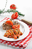 Pork necks with quinoa and tomato chutney