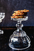 Savory cheese crackers on a glass
