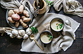 Bowls with tasty Jerusalem artichoke soup