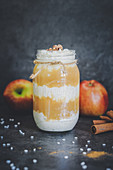 A layered dessert made from apple compote and rice pudding with cinnamon