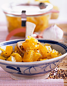 Pickled pumpkin in curry, ginger, pineapple juice and mustard seeds