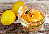 Spicy pickled golden beets with white wine and cloves