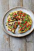 Vegetable omelette with peas, mushrooms and pepper