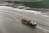 Barge with shipping containers, aerial photograph