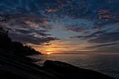Sunset over Lake Superior shoreline