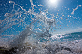 Waves crashing against rocks